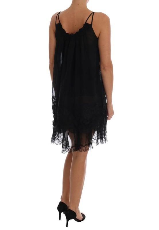 Brand: Dolce & Gabbana
  Model: Chemise lingerie dress
  Color: Black
  Zipper closure on the back
  Logo details
  Made in Italy
  Material: 36% Cotton 10% PA 50% Silk 4% Viscose