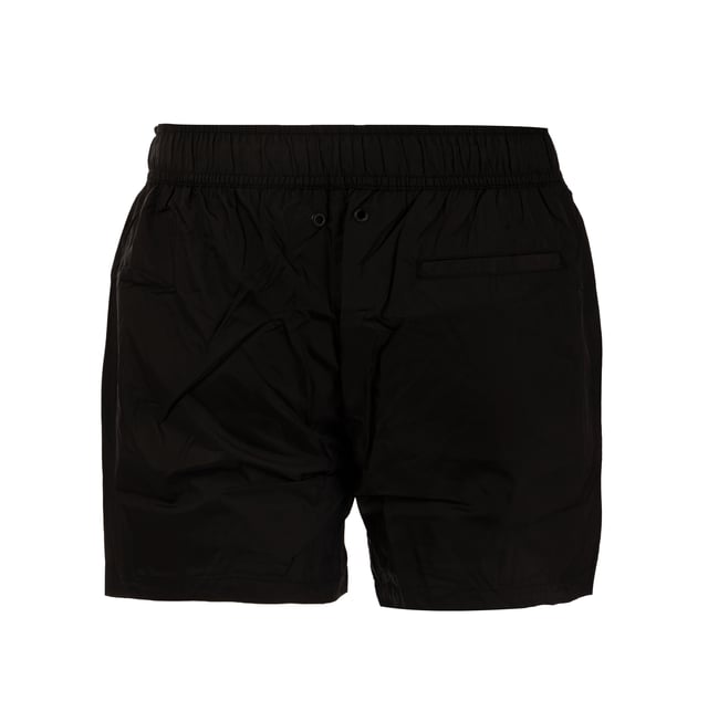 Eleganz und Raffinesse treffen bei der Boardshort von BIKKEMBERGS auf sportlichen Geist. Charakteristisch für dieses Modell ist die unifarbene Farbe, die Nüchternheit ausstrahlt, Dieses Modell zeichnet sich durch ein markantes Detail am Gummiband mit dem Logo der Marke aus, das dem Gesamtbild einen Hauch von Klasse verleiht.