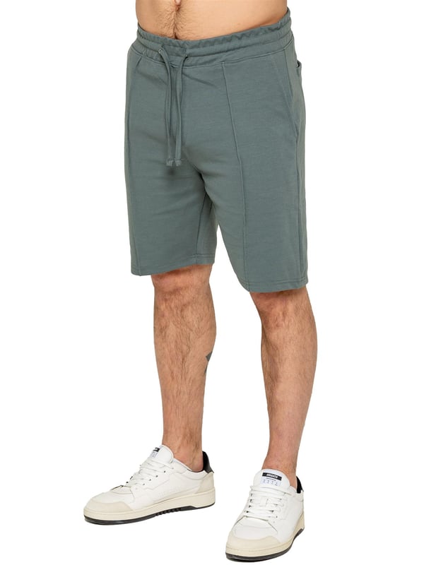 The Enzo Men's Piping Shirt & Shorts Tracksuit offers a stylish and comfortable look. The button-up shirt features a revere collar and white piping details on the collar and sleeves for a refined touch. Made from stretch fabric, it provides flexibility and a sleek fit. Paired with matching stretch shorts, this set ensures comfort and functionality with an elastic waistband, adjustable drawstring, and multiple pockets. Perfect for casual outings or lounging in style. (650&619)