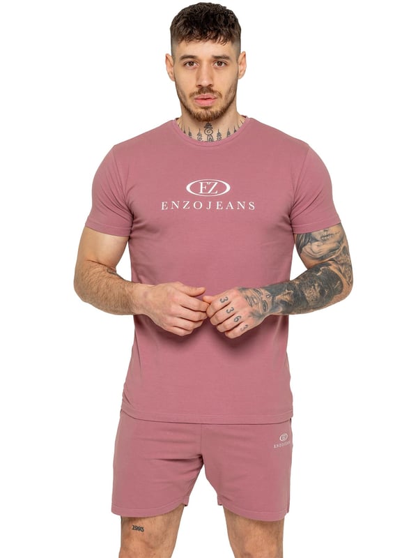 The Enzo Men's Gym Tracksuit is designed for both performance and style. The slim-fit T-shirt contours to the body for a sleek, athletic look, while the ribbed crew neck adds durability. The stretch material with Lycra fabric ensures maximum flexibility and comfort. The matching gym shorts feature a regular fit for ease of movement, with an elasticated waistband for a secure fit. The bold Enzo Jeans branding on both pieces adds a sporty edge.