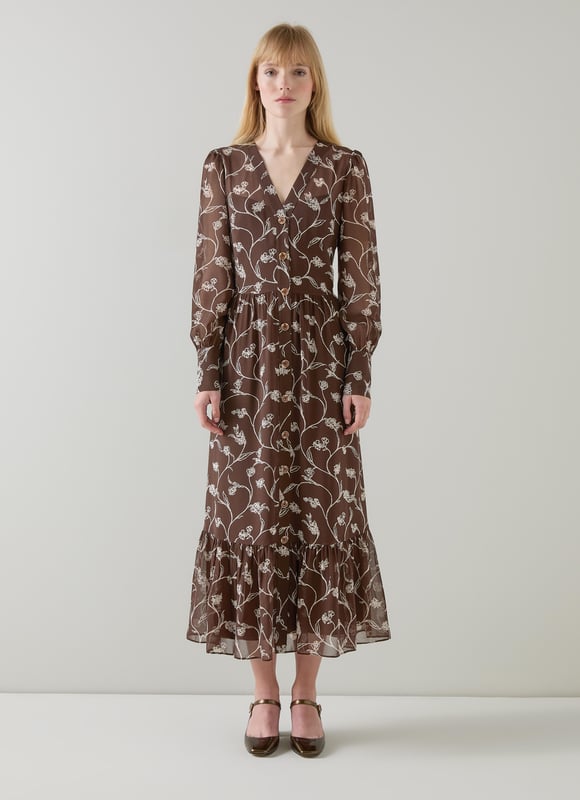LK Bennett Lucian Dresses, Brown A dreamy addition to your wardrobe, our Lucian dress in chocolate and birch brings elegance and charm effortlessly. This sketchy flower print tiered dress, woven from high-quality fabric, features a flattering V-neck and full length sleeves for a timeless look. Perfectly pair it with ankle boots or strappy heels for your next smart casual affair.