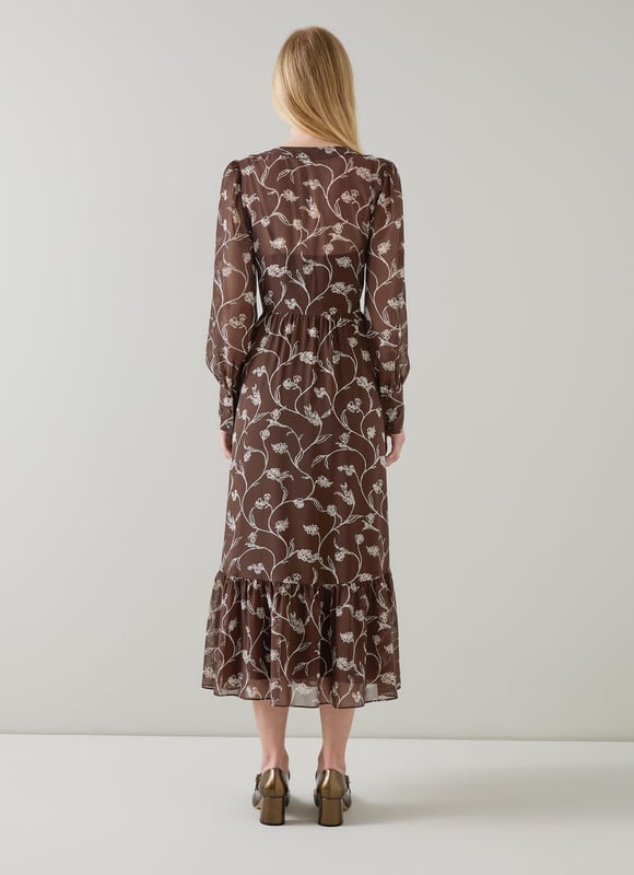 LK Bennett Lucian Dresses, Brown A dreamy addition to your wardrobe, our Lucian dress in chocolate and birch brings elegance and charm effortlessly. This sketchy flower print tiered dress, woven from high-quality fabric, features a flattering V-neck and full length sleeves for a timeless look. Perfectly pair it with ankle boots or strappy heels for your next smart casual affair.