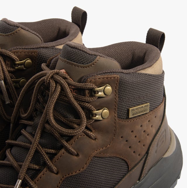 Skechers 210932/COC CAMBERT - HARLAN Mens Boots Cocoa Skechers 210932/COC CAMBERT - HARLAN Mens Boots Cocoa
* Upper Material: Synthetic
* Lining Material: Textile
* Sole Material: Rubber
* Closure/Fastening: Lace-Up
* Features: Comfort,Memory Foam,Waterproof,Breathable
* Toe Shape: Round
* Shoe Width: Relaxed
* Item Weight: 0 KG
* Heel Height: Low (2.5-4.9cm)
* Shoe Shaft Height: Ankle
* Boot Style: Ankle Boots
* Gift Boxed: No Product Code: 210932/COC