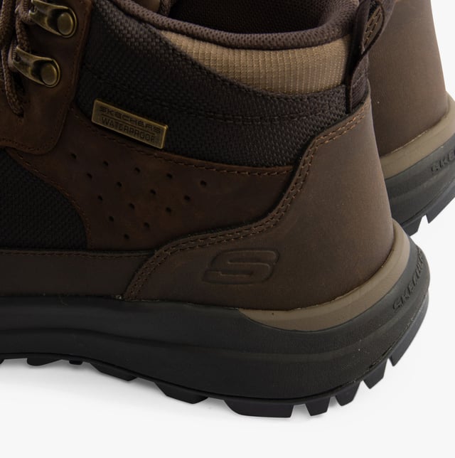 Skechers 210932/COC CAMBERT - HARLAN Mens Boots Cocoa Skechers 210932/COC CAMBERT - HARLAN Mens Boots Cocoa
* Upper Material: Synthetic
* Lining Material: Textile
* Sole Material: Rubber
* Closure/Fastening: Lace-Up
* Features: Comfort,Memory Foam,Waterproof,Breathable
* Toe Shape: Round
* Shoe Width: Relaxed
* Item Weight: 0 KG
* Heel Height: Low (2.5-4.9cm)
* Shoe Shaft Height: Ankle
* Boot Style: Ankle Boots
* Gift Boxed: No Product Code: 210932/COC