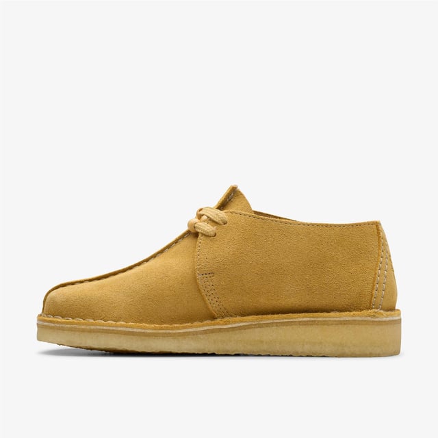 Desert Trek shoes feature a signature central butt seam, upper crafted from premium suede for durability and style. Designed with a lace-up fastening and a distinctive contrast crepe sole for all-day comfort and traction
