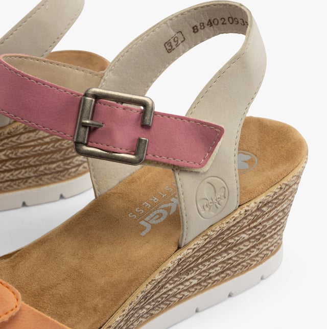 Rieker 61960-90 Womens Sandals Multi

 Upper Material: Synthetic

Lining Material: Textile

Sole Material: Synthetic

Closure/Fastening: Buckle,Touch Fasten

Features: Comfort,Breathable

Heel Type: Wedge

Shoe Width: Relaxed

Item Weight: 1 KG

Heel Height: Medium (5-7.4cm)

Sandal Style: Sandals

Gift Boxed: No
Product Code: 61960-90