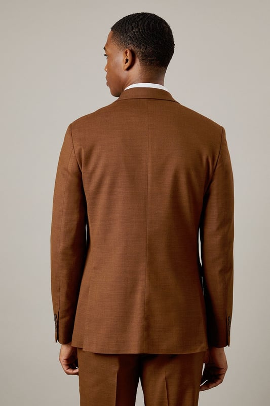 Slim fit design for a modern, tailored silhouette
        Notched lapels for a classic suit jacket appearance
        Two-button front closure for versatile styling
        Flap pockets at the waist for practicality and style
        Subtle twill texture adds depth to the fabric
    
    This Burton slim fit suit jacket is the epitome of refined style for the modern gentleman. Perfect for those who appreciate classic tailoring with a contemporary edge, this jacket offers a sleek silhouette that flatters the figure without compromising on comfort. The versatile design makes it ideal for a range of occasions, from important business meetings to sophisticated evening events. Style it with the matching trousers and waistcoat for a complete look, or pair it with dark denim and a crisp white shirt for a smart-casual ensemble. The subtle twill texture adds an interesting dimension to the fabric, ensuring you stand out for all the right reasons. Whether you're heading to the office, a wedding, or meeting friends at an upscale pub, this jacket will help you project confidence and style.