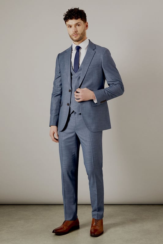 Slim fit design for a modern, tailored silhouette
        Notch lapel and two-button closure for classic styling
        Flap pockets and welt breast pocket for functionality and style
        Four-button cuffs for a refined finish
        Matching waistcoat and trousers available for a complete suit
    
    This Burton slim fit suit jacket offers a contemporary take on traditional tailoring, perfect for the modern gentleman who appreciates classic style with a refined edge. The slim fit design creates a sleek silhouette that flatters the body without compromising on comfort. Pair with the matching trousers and waistcoat for a complete look that's ideal for weddings, important business meetings, or sophisticated evening events. For a smart casual ensemble, try wearing the jacket with dark denim jeans and a crisp white shirt. The versatile design allows for easy styling - dress it up with a tie and pocket square for formal occasions, or keep it relaxed with an open-collar shirt for after-work drinks. The subtle texture of the fabric adds depth to your outfit, ensuring you stand out for all the right reasons. Whether you're heading to the office, a special celebration, or a night out at your local, this jacket will have you looking sharp and feeling confident.