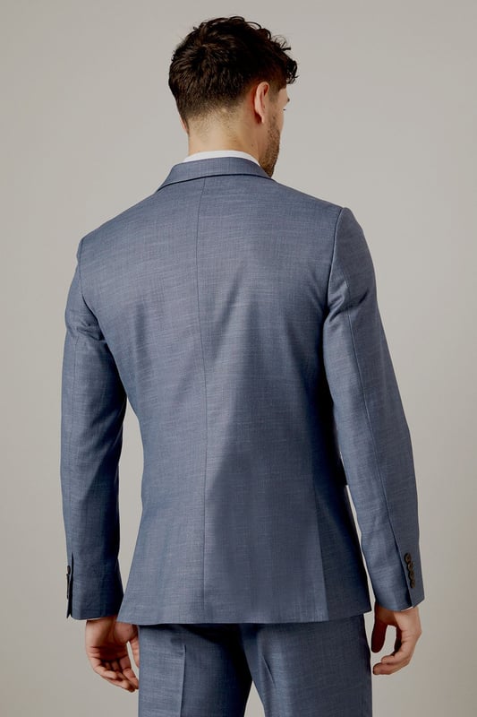 Slim fit design for a modern, tailored silhouette
        Notch lapel and two-button closure for classic styling
        Flap pockets and welt breast pocket for functionality and style
        Four-button cuffs for a refined finish
        Matching waistcoat and trousers available for a complete suit
    
    This Burton slim fit suit jacket offers a contemporary take on traditional tailoring, perfect for the modern gentleman who appreciates classic style with a refined edge. The slim fit design creates a sleek silhouette that flatters the body without compromising on comfort. Pair with the matching trousers and waistcoat for a complete look that's ideal for weddings, important business meetings, or sophisticated evening events. For a smart casual ensemble, try wearing the jacket with dark denim jeans and a crisp white shirt. The versatile design allows for easy styling - dress it up with a tie and pocket square for formal occasions, or keep it relaxed with an open-collar shirt for after-work drinks. The subtle texture of the fabric adds depth to your outfit, ensuring you stand out for all the right reasons. Whether you're heading to the office, a special celebration, or a night out at your local, this jacket will have you looking sharp and feeling confident.