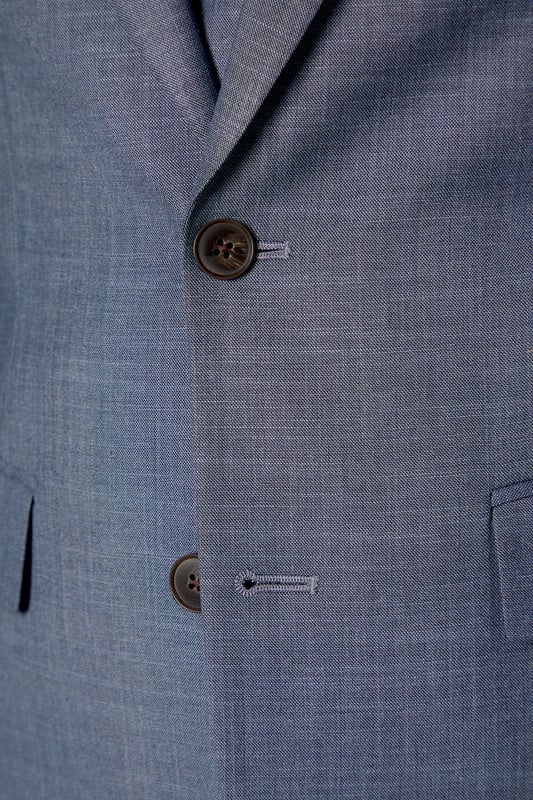 Slim fit design for a modern, tailored silhouette
        Notch lapel and two-button closure for classic styling
        Flap pockets and welt breast pocket for functionality and style
        Four-button cuffs for a refined finish
        Matching waistcoat and trousers available for a complete suit
    
    This Burton slim fit suit jacket offers a contemporary take on traditional tailoring, perfect for the modern gentleman who appreciates classic style with a refined edge. The slim fit design creates a sleek silhouette that flatters the body without compromising on comfort. Pair with the matching trousers and waistcoat for a complete look that's ideal for weddings, important business meetings, or sophisticated evening events. For a smart casual ensemble, try wearing the jacket with dark denim jeans and a crisp white shirt. The versatile design allows for easy styling - dress it up with a tie and pocket square for formal occasions, or keep it relaxed with an open-collar shirt for after-work drinks. The subtle texture of the fabric adds depth to your outfit, ensuring you stand out for all the right reasons. Whether you're heading to the office, a special celebration, or a night out at your local, this jacket will have you looking sharp and feeling confident.