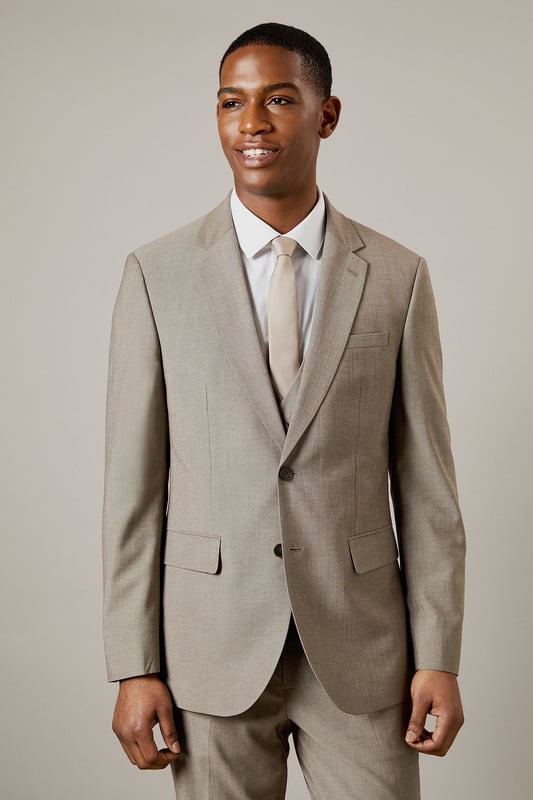 Tailored fit for a refined silhouette
        Notched lapels for classic sophistication
        Two-button front closure for versatile styling
        Flap pockets add functional elegance
        Four-button cuffs for a polished finish
    
    This Burton tailored fit suit jacket offers a perfect balance of classic style and modern cut. The jacket is designed to define your shoulders and chest while tapering at the waist for a flattering silhouette. Ideal for the gentleman who appreciates timeless elegance, this jacket is versatile enough for various occasions. Pair it with matching trousers and a crisp white shirt for formal events, or dress it down with chinos and loafers for smart-casual gatherings. The neutral hue allows for easy coordination with a range of shirt and tie combinations, making it a staple for your professional wardrobe. Whether you're heading to an important business meeting or joining mates for a sophisticated night out, this jacket will ensure you look sharp and feel confident.