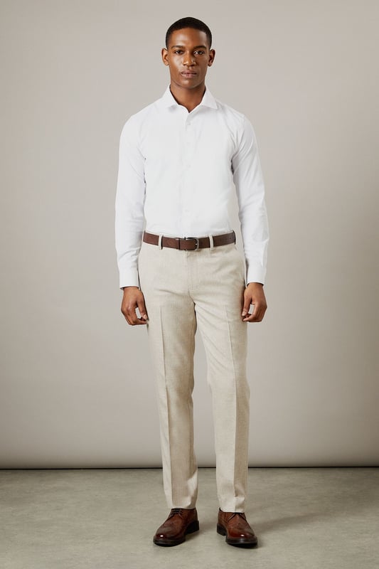 Slim fit design for a modern, tailored silhouette
        Semi-plain fabric adds subtle texture and interest
        Belt loops for versatile styling options
        Side pockets for practicality
        Pressed centre creases for a sharp, polished look
    
    These Burton slim fit suit trousers offer a contemporary take on classic tailoring. The semi-plain fabric provides a refined appearance with a touch of visual interest, perfect for the discerning gent who appreciates subtle style. The slim fit cut creates a sleek silhouette that's ideal for both office wear and smart-casual events. Pair these trousers with a crisp white shirt and brown leather brogues for a sophisticated look that transitions seamlessly from boardroom to bar. For a more relaxed ensemble, team with a light knit jumper and smart trainers. The versatility of these trousers makes them a wardrobe essential for the modern man who values both style and practicality in his attire.