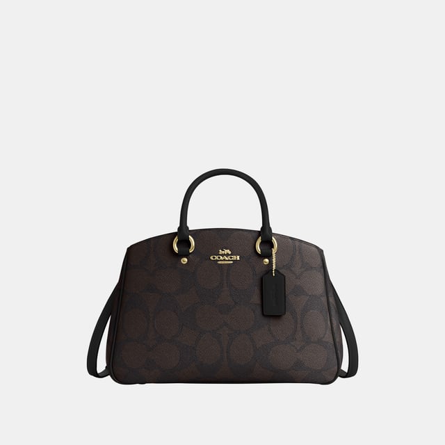 Savannah Carryall in Maxi Signature Canvas, Four protective feet at base, Inside multifunction pocket
 Center zip compartment,  Length: 35.50 cm,  Width: 12.50 cm,  Height: 22.50 cm