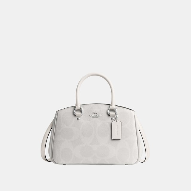 Savannah Small Carryall in Maxi Signature Canvas, Four protective feet at base, Inside multifunction pocket
 Center zip compartment,  Length: 28.50 cm,  Width: 10.00 cm,  Height: 18.00 cm