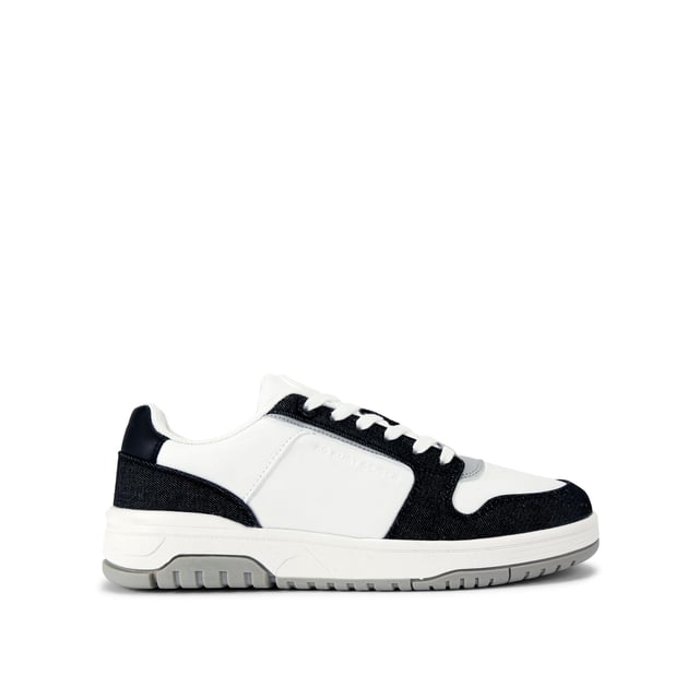 This KG Kurt Geiger Ryder 2 sneaker features a white upper with black denim panel detail. The front laces up with a gunmetal branded plate. There is embossed branding on the side and tongue.