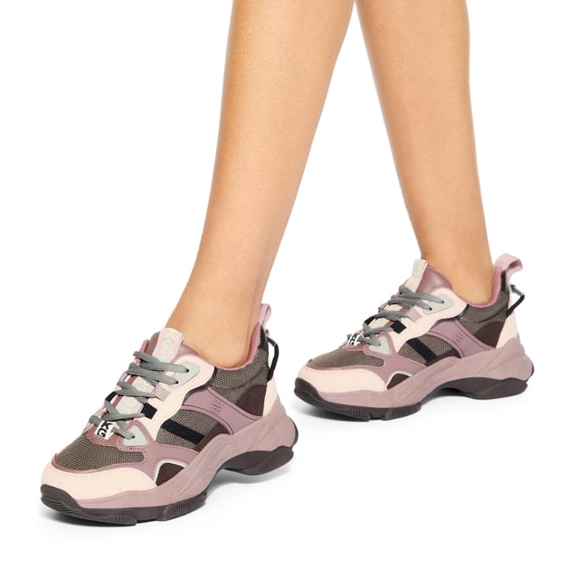 This Lila Trek sneaker arrives with a tonal upper with mesh and rubber panels. The front laces up and there is a KG Kurt Geiger tab on the tongue.
