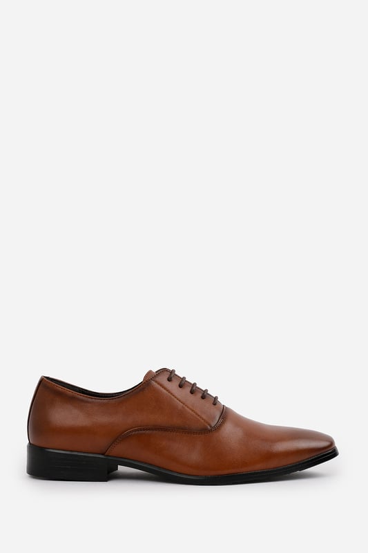 Enhance your formal footwear collection with these  Michael oxford lace up work dress shoes . Designed with sophistication and comfort in mind, these shoes are the perfect choice for formal occasions, business meetings, or evening events. 
Key Features: 
 Chic Design: The lace up offers a distinctive and stylish look, setting these shoes apart from conventional formal footwear. The smooth leather finish and clean lines create a polished and sophisticated appearance. 
   Durable Construction: Made with high-quality PU material, these shoes are built to last. The sturdy outsole ensures reliable wear, while the precise stitching adds durability and refinement to the overall design. 
   Comfortable Fit: Designed for all-day wear, these shoes feature a padded insole that provides excellent cushioning. The slip-resistant outsole ensures stability and comfort, making them ideal for long hours of wear. 
Specifications 
Material: Premium-quality faux leather 
Closure: Lace up. 
Outsole: Durable and slip-resistant 
Elevate your formal attire with these Nick oxford lace up work dress shoes. Combining style, durability, and comfort, they are an essential addition to any wardrobe. Perfect for professionals and fashion-forward individuals alike!