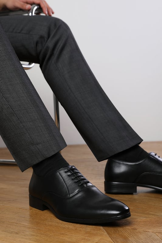 Enhance your formal footwear collection with these  Michael oxford lace up work dress shoes . Designed with sophistication and comfort in mind, these shoes are the perfect choice for formal occasions, business meetings, or evening events. 
Key Features: 
 Chic Design: The lace up offers a distinctive and stylish look, setting these shoes apart from conventional formal footwear. The smooth leather finish and clean lines create a polished and sophisticated appearance. 
   Durable Construction: Made with high-quality PU material, these shoes are built to last. The sturdy outsole ensures reliable wear, while the precise stitching adds durability and refinement to the overall design. 
   Comfortable Fit: Designed for all-day wear, these shoes feature a padded insole that provides excellent cushioning. The slip-resistant outsole ensures stability and comfort, making them ideal for long hours of wear. 
Specifications 
Material: Premium-quality faux leather 
Closure: Lace up. 
Outsole: Durable and slip-resistant 
Elevate your formal attire with these Nick oxford lace up work dress shoes. Combining style, durability, and comfort, they are an essential addition to any wardrobe. Perfect for professionals and fashion-forward individuals alike!