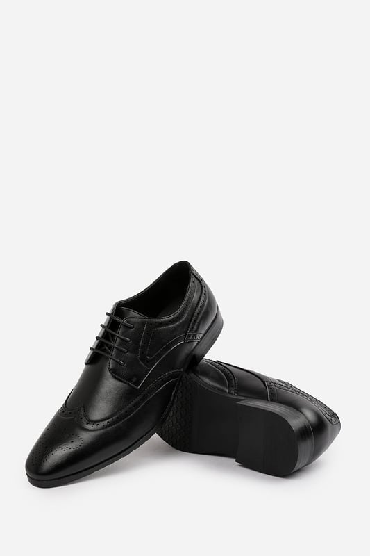 Elevate your formal style with these Dominic lace up derby textured formal dress work shoes. With a lace-up design, these shoes add a timeless appeal, perfect for any formal occasion. Step up your formal game with these elegant elliot Lace Up Derby textured Shoes, a perfect blend of style and comfort.

Key Features: 



Formal Design:   These shoes feature a sleek and classic design that adds sophistication to your outfit. The lace-up design adds a touch of visual interest, making these shoes stand out.

Comfortable Fit:   The shoes provides a comfortable and stable fit that is suitable for all-day wear. The lace up allows for an adjustable and secure fit, ensuring that these shoes stay comfortably on your feet.

Durable Construction:   Crafted with high-quality materials, these shoes are built to last. The sturdy construction ensures durability and longevity, making them a reliable choice for regular wear.

Suitable for Any Occasion: perfect for formal occasions or simply want to elevate your everyday look, these shoes are suitable for any occasion. Their formal design and comfortable fit make them a versatile choice for all-day wear.

    Specification:-    Pattern: Solid    Upper Material: PU    Occasion: Formal    Product Type: Derby Shoes    Shoe Type: Lace-Up    Invest in our Elliot lace up derby textured formal dress work shoes and experience the perfect blend of style, comfort, and durability. Pair it with earthy tones like beige, grey, or brown chinos, or opt for a more dressy pants variant, and step out with confidence.