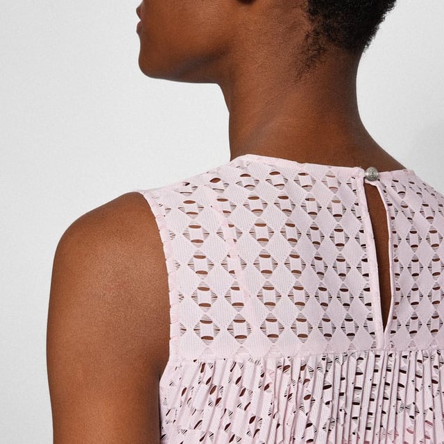 Women's Boss Deplica Dress. A contemporary dress in a straight fit by BOSS Womenswear. Featuring a D-ring belt for definition at the waist, this feminine dress is crafted in stretch lace with an intricate pattern. Cotton lining completes this piece.- Mid length.- Sleeveless design.- Off-white colourway.- Flared cut.- Crew neck.- Pleated.- Perforated design. Material: 92% Polyester, 8% Elastane. Ref: 50472469684.