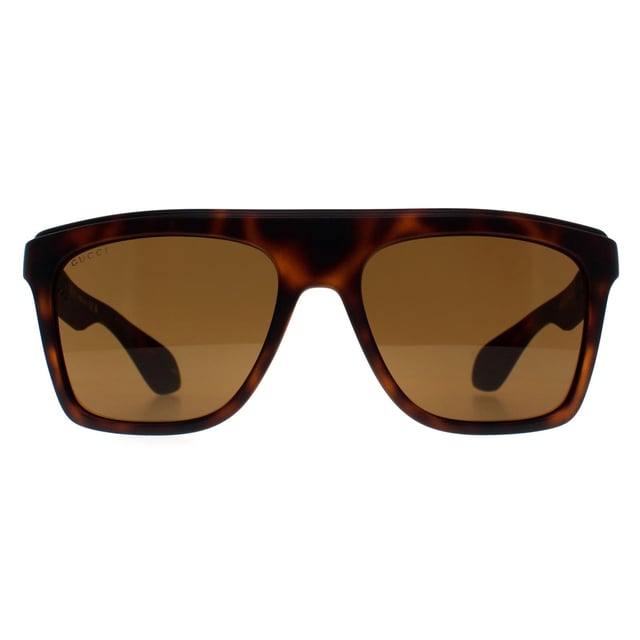 Gucci Rectangle Mens Dark Havana Brown GG1570S  Sunglasses are designed with a refined and bold look, featuring aviator-style frames with sleek metal accents. The combination of a classic silhouette and contemporary details makes these sunglasses versatile for both casual and formal occasions.