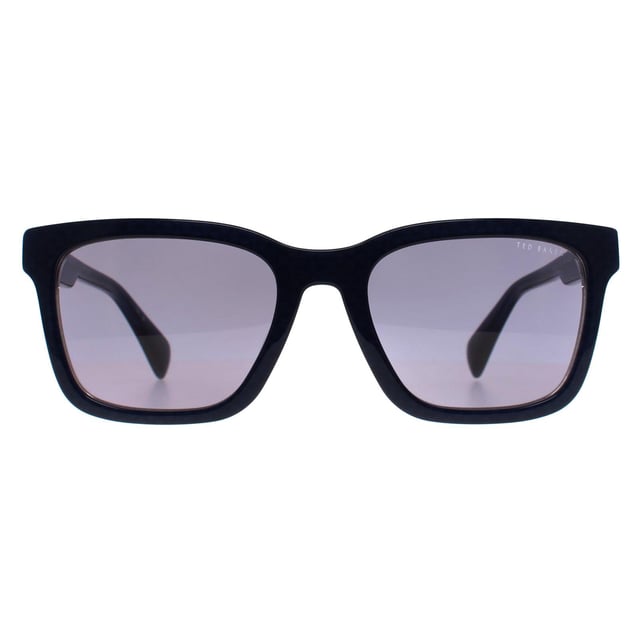 Ted Baker Rectangle Mens Black on Clear Green TB1722 Garret  Sunglasses feature a minimalist, rectangular frame with clean lines. Offering both comfort and excellent UV protection, they are perfect for individuals seeking both style and function.