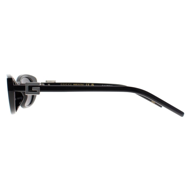 Gucci Cat Eye Womens Black Grey GG1680S  Sunglasses are a luxurious blend of timeless elegance and contemporary style. Featuring a sleek, cat eye frame with bold lines, these sunglasses offer a sophisticated yet fashion-forward look. The high-quality lenses provide superb UV protection, shielding your eyes from harmful sun exposure while maintaining clear, crisp vision. Detailed with the iconic Gucci logo on the temples, the GG1680S sunglasses make a statement of high-end luxury and refinement. Whether you're lounging in the sun or out for a stylish outing, these sunglasses elevate any outfit with their distinctive, high-fashion appeal.