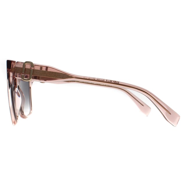 Marc Jacobs Square Womens Transparent Nude Dark Grey Gradient MARC 764/S  Sunglasses features sharp, square frames with modern detailing, making it ideal for those who love to make a statement with their accessories.