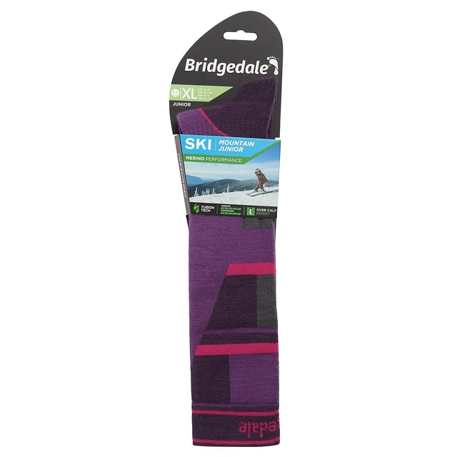 Bridgedale Ski Mountain Junior Racer Over Calf Merino Performance Socks: Experience exceptional comfort and sophisticated style with the Bridgedale Ski Mountain Junior Racer Over Calf Merino Performance Socks in chic Grey/Green. Mindfully designed for children's tender, growing feet, these versatile socks assure to smoothly blend with winter gears, making them an astute addition to your kids' collection. Enjoy the supreme comfort these socks offer, a bliss for every young adventurer. Our socks are skilfully crafted to invigorate and uplift your little one's winter attire. Bridgedale Ski Mountain Junior Racer Socks come with an array of merits. Their unique design and colour add a hint of timeless grace to your look while the cosy fabric guarantees enduring comfort. Moreover, our sweat-absorbent Merino wool blend fabric assures top foot hygiene, leaving your child's feet fresh and odour-free. Embrace the ultimate blend of comfort and style with our Bridgedale Ski Mountain Junior Racer Over Calf Merino Performance Socks - your top pick for premium child sock wear. Essential Product Details: - Bright and stylish - Top-grade materials - Lifelong durability - Ideal for all seasons - Perfect for winter sports situations - Suitably fits versatile sizes