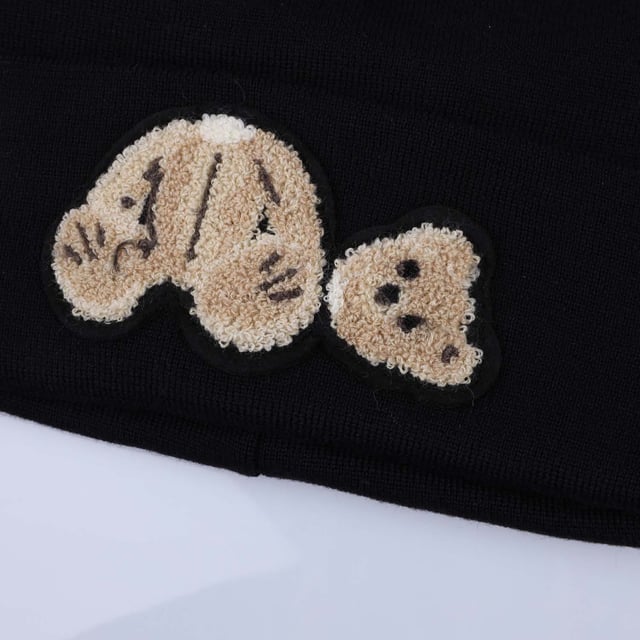 Womens Palm Angels Bear Beanie in black - brown.- Soft wool blend knit.- Turn-up cuff with Bear graphic patch to front.- One size.- 50% Wool  50% Acrylic.  Detail: 40% Wool  40% Acrylic  20% Polyester.  Dry clean only.- Ref: PWLC0090011060