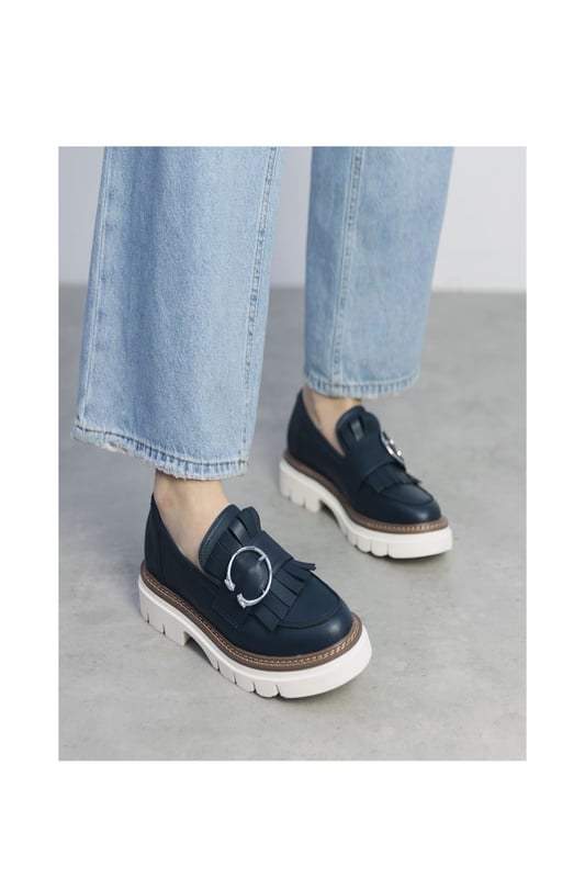 Dress to impress in Dallia, the chunky loafer with a cleated sole. This style features a classic snaffle trim for a sleek look with stitched detailing for a luxe feel. Complete with a leather sock for ultimate comfort.