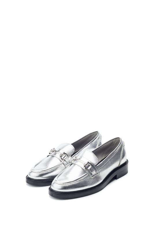 Complete your wardrobe with Estephe, the classically designed loafer. Featuring a timeless snaffle trim, complemented by an almond toe for a feminine feel. Complete with a leather sock for ultimate comfort.