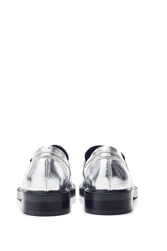 Complete your wardrobe with Estephe, the classically designed loafer. Featuring a timeless snaffle trim, complemented by an almond toe for a feminine feel. Complete with a leather sock for ultimate comfort.