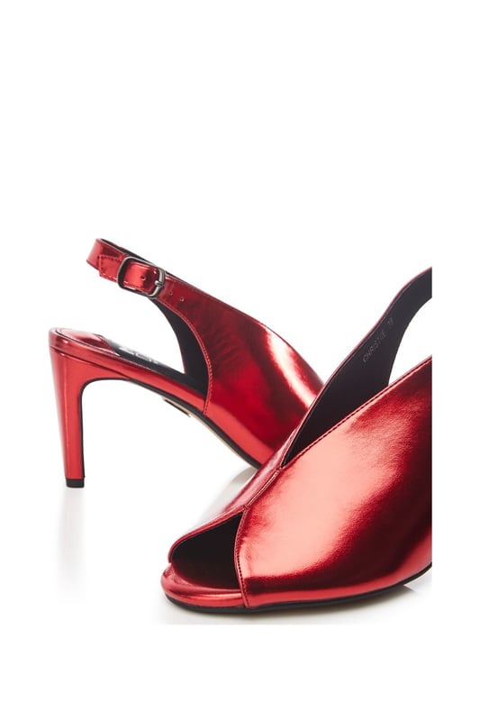 Arrive in style with Christiie, the sling back peep toe shoe with added embellishments. This heel features a buckle fastening for a secure fastening whilst the padded sock and leather lining ensure a comfortable wear. Matching clutch bag available.