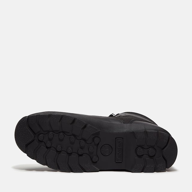 Hiking boots crafted with premium Timberland® leather and canvas upper, cushioned EVA footbed, and ReBOTL™ fabric lining made from at least 50% recycled PET plastic. Durable rubber lug outsole for enhanced traction.
