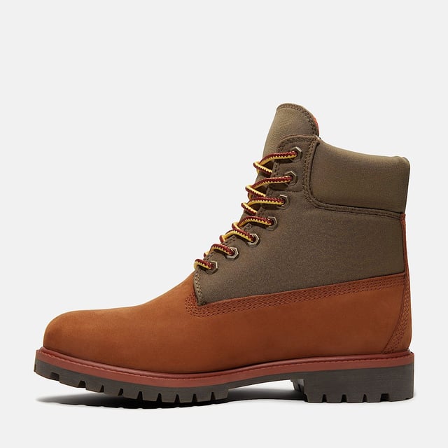 6-Inch Waterproof Boot crafted with a waterproof premium leather and canvas upper, this boot features a TimberDry™ waterproof membrane to keep your feet dry in any weather. The padded collar ensures comfort, while the anti-fatigue removable footbed provides all-day support. The durable rubber lug outsole offers excellent traction on various surfaces.