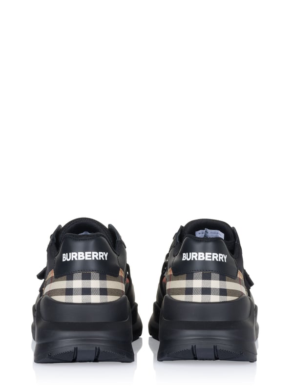 42% piel de becerro, 35% poliamida, 12% algodón, 11% poliéster; Zapatilla baja Burberry RAMSEY;  Modelo: 8056920 1003;  Mano de obra de alta calidad;  Parte superior baja;  Cordón clásico;  Cierre de velcro con logotipo decorativo;  Punta redonda;  suela de plataforma;  Suela de goma antideslizante;  Detalles del logotipo de Burberry