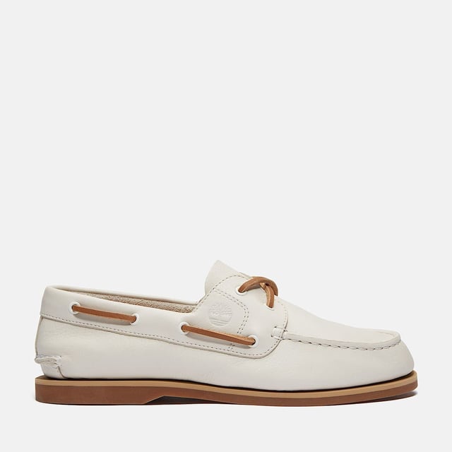 Timberland classic boat shoe features a premium Timberland® leather upper with 360° functional rawhide lacing system. Designed with a non-marking siped rubber outsole for superior grip on wet and dry surfaces, delivering timeless style and all-day comfort.