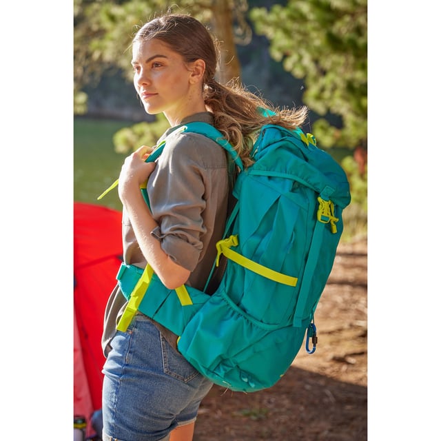 Mountain Warehouse Venture Backpack (Green) 100% Polyester. Fabric: Ripstop. Height: 57.1cm. Length: 37cm. Width: 18cm. Adjustable Chest Strap, Collapsible, Compression Straps, Hydration Bladder Compatible, Padded Hip Belt, Raincover. Durable, Heavy Duty. Fastening: Snap Buckle. Compartments: Zipped Compartment.