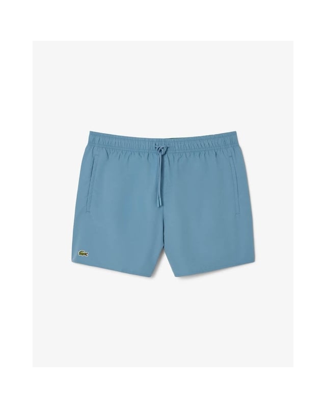Step out of the water almost dry with these recycled quick-dry recycled polyester taffeta swim shorts. Loaded with practical features including two side pockets, mesh lining and a contrast drawstring. Your weekend getaway just got more exciting.
Light recycled quick-dry taffeta (smooth, very light weaved fabric with a slightly shiny finish)Side pocketsElasticised waistband with contrast drawstringMesh liningEmbroidered green crocodile on thighPolyester (100%)
MH6270