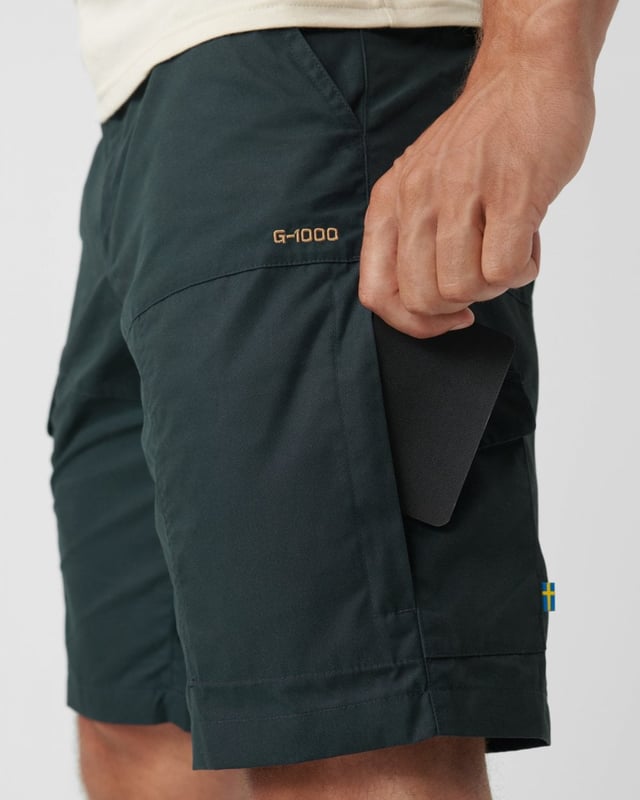 Men’s Karl Pro Shorts M
Durable shorts made from durable G-1000 Silent in recycled polyester and organic cotton. Technical cut with a pre-shaped seat and lots of practical pockets for things you want close at hand. Spacious leg pockets. A well-fitting outdoor favourite for summer’s casual outdoor life at the cabin, in the forest or on the mountain.

Durable G-1000 Silent in recycled polyester and organic cotton.
One leg pocket with a zipper, one with buttons.
Little pocket for a multitool.
Hand pockets and back pockets with flaps.
Adaptable with Greenland Wax, Durable, Quick-drying, Ventilation, Water resistant
Contains non-textile elements of animal origin.

Additional care instructions

40°C normal process
do not dry clean
do not tumble dry
do not bleach
iron 1 dot - Max 110°C
wash with similar colors, do not use fabric softener

Composition material

G-1000® Silent: 65% polyester (recycled), 35% cotton (organic)

Regular Fit
F87224