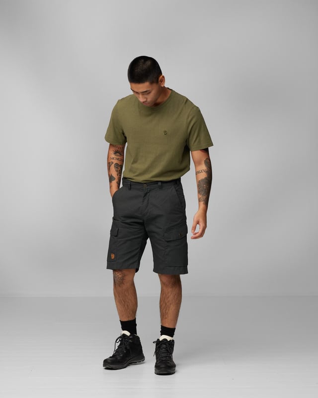 Men’s Ruaha Shorts M
Lightweight, sturdy travel shorts in G-1000 Lite. Practical for travel adventures and long trips when you need durable garments that can withstand harder wear. Roomy leg pockets with flaps, ergonomically placed on the side of the leg and with diagonal openings for better access. Two hand pockets and zippered back pockets that are hidden under a flap.

Travel shorts in hard-wearing G-1000® Lite.
Two hand pockets, two leg pockets, two welt pockets with hidden zippers and an inside safety pocket.
Inseam length 28 cm in size 48.
Adaptable with Greenland Wax, Durable, Quick-drying, Ventilation, Water resistant
Contains non-textile elements of animal origin.

Additional care instructions

40°C normal process
do not dry clean
do not tumble dry
do not bleach
iron 1 dot - Max 110°C
wash with similar colors, do not use fabric softener

Composition material

G-1000® Lite: 65% polyester (recycled), 35% cotton (organic)

Regular Fit
F81188