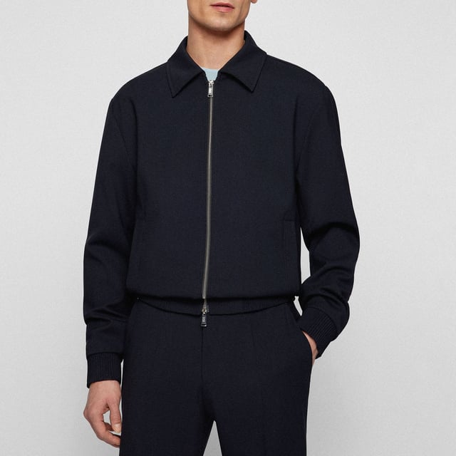 Men's Boss P-Hanry Jacket.- Notch lapels.- 2 button front fastening.- 2 front open pockets.- 4 button cuffs.- Slim fit. Material: 53% Polyester, 43% Wool, 4% Elastane. Ref: 50469032404.
