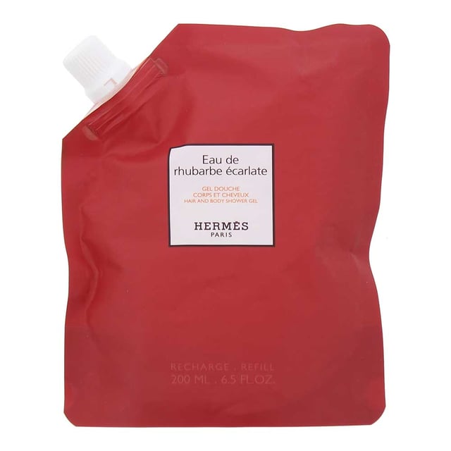 Hermes Eau De Rhubarbe Écarlate Refill Hair And Body Shower Gel 200ml Hermès Eau De Rhubarbe Écarlate Refill Hair and Body Shower Gel provides a refreshing and invigorating cleanse. Its gentle formula creates a soft, luxurious lather that leaves both hair and skin feeling smooth, refreshed, and delicately fragranced. Designed as a refill, it offers a sustainable way to enjoy a daily touch of luxury.