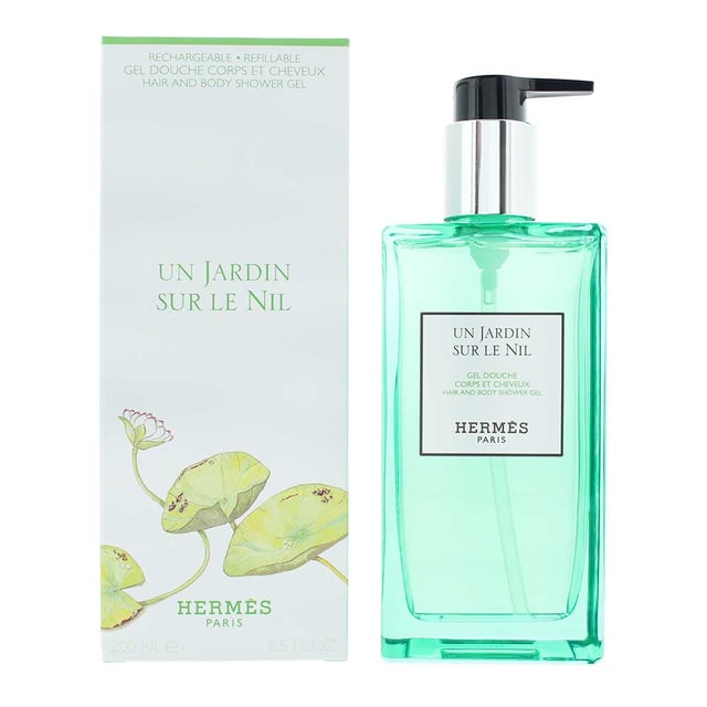 Hermes Un Jardin Sur Le Nil Hair And Body Shower Gel 200ml Hermès Un Jardin Sur Le Nil Hair and Body Shower Gel delivers a refreshing and invigorating cleansing experience. Infused with the vibrant, citrusy-green scent of Un Jardin Sur Le Nil, it gently cleanses both hair and skin, leaving them soft and delicately fragranced. Its lightweight formula lathers beautifully, providing a feeling of freshness and elegance. Perfect for daily use, it transforms your shower routine into a luxurious escape.