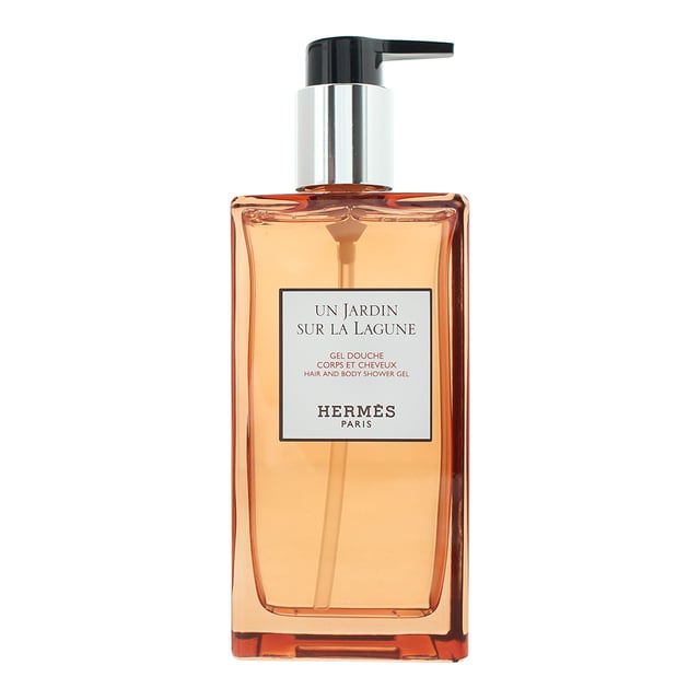 Hermes Un Jardin Sur La Lagune Hair And Body Shower Gel 200ml Hermès Un Jardin Sur La Lagune Hair and Body Shower Gel offers a luxurious and refreshing cleanse, enveloping you in the dreamy, floral-woody scent of Un Jardin Sur La Lagune. Its gentle formula lathers beautifully, leaving both hair and skin feeling soft, smooth, and delicately perfumed. Perfect for daily use, it transforms your shower routine into an elegant sensory escape.