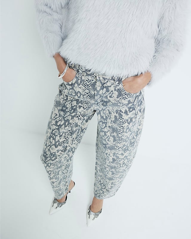 Denim fabric, Snake print, Seamed, Classic 5 pockets, Button and zip fastening, Belt loops