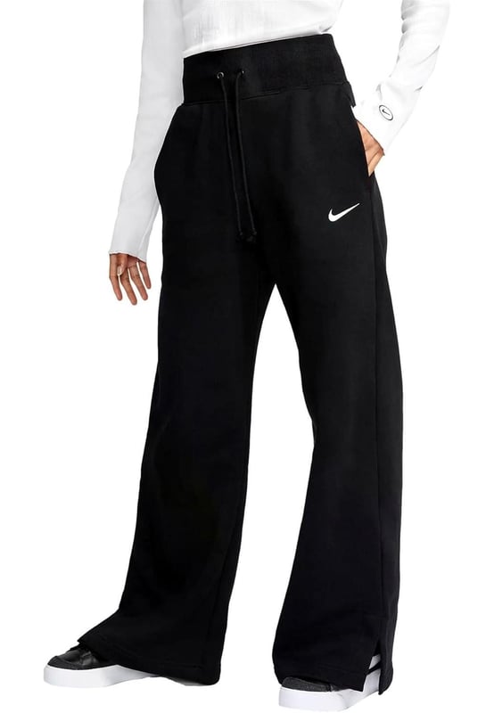 Nike Ladies Phoenix fleece wide pant reimagines luxury loungewear with a bold, high-waisted design. - -. Crafted from soft, brushed midweight fleece, these full-length joggers offer a cosy yet structured fit. - -. With a high-rise waistband, drawcord for a snug fit, side pockets and elongated ribbing, they bring effortless style and comfort.