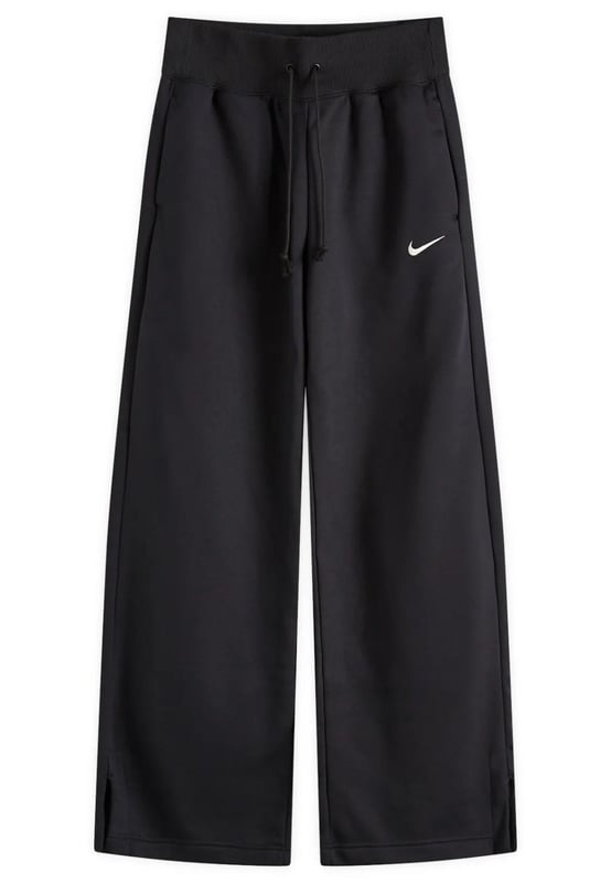 Nike Ladies Phoenix fleece wide pant reimagines luxury loungewear with a bold, high-waisted design. - -. Crafted from soft, brushed midweight fleece, these full-length joggers offer a cosy yet structured fit. - -. With a high-rise waistband, drawcord for a snug fit, side pockets and elongated ribbing, they bring effortless style and comfort.