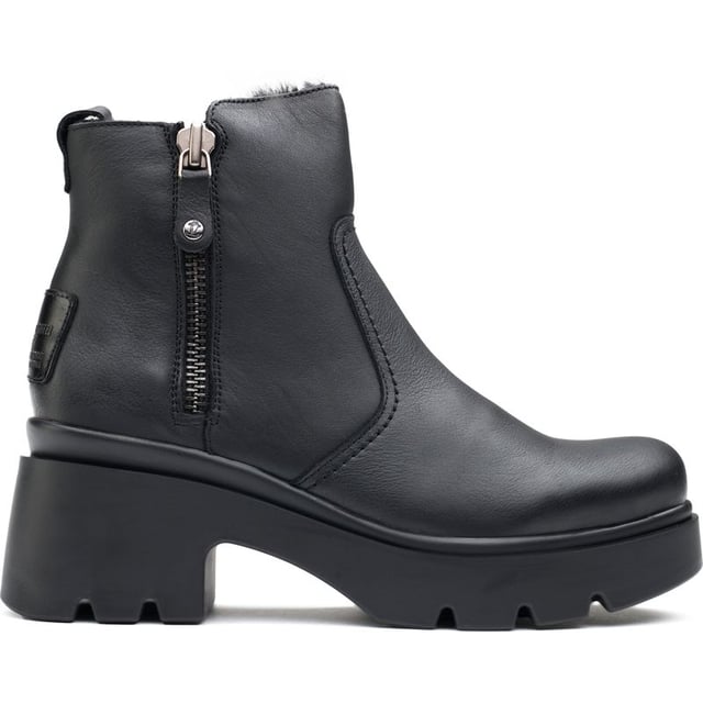 Embrace the seasonal changes in style and confidence with the Panama Jack Phuket ankle boots. These black Leather boots blend premium materials with a cleated, rugged rubber sole to provide a gripping, sturdy stride, whilst the block heel and raised sole give extra height. The cosy, cuddly faux fur plush lining keeps your feet warm on chilly days. Their contemporary design showcases a toggled zip with silver hardware and heel branding. These Panama Jack boots are your quintessential companion for a versatile, modern look.